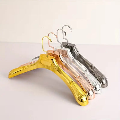 cintres plastique métallisés – 38 et 44 cm – Large épaules – Boutique prêt‑à‑porter